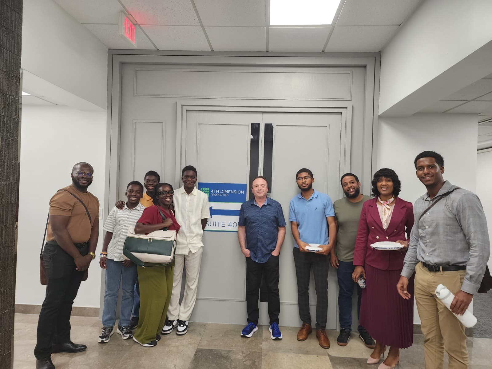 True North Circle participants and mentors outside the 4th Dimension Properties office